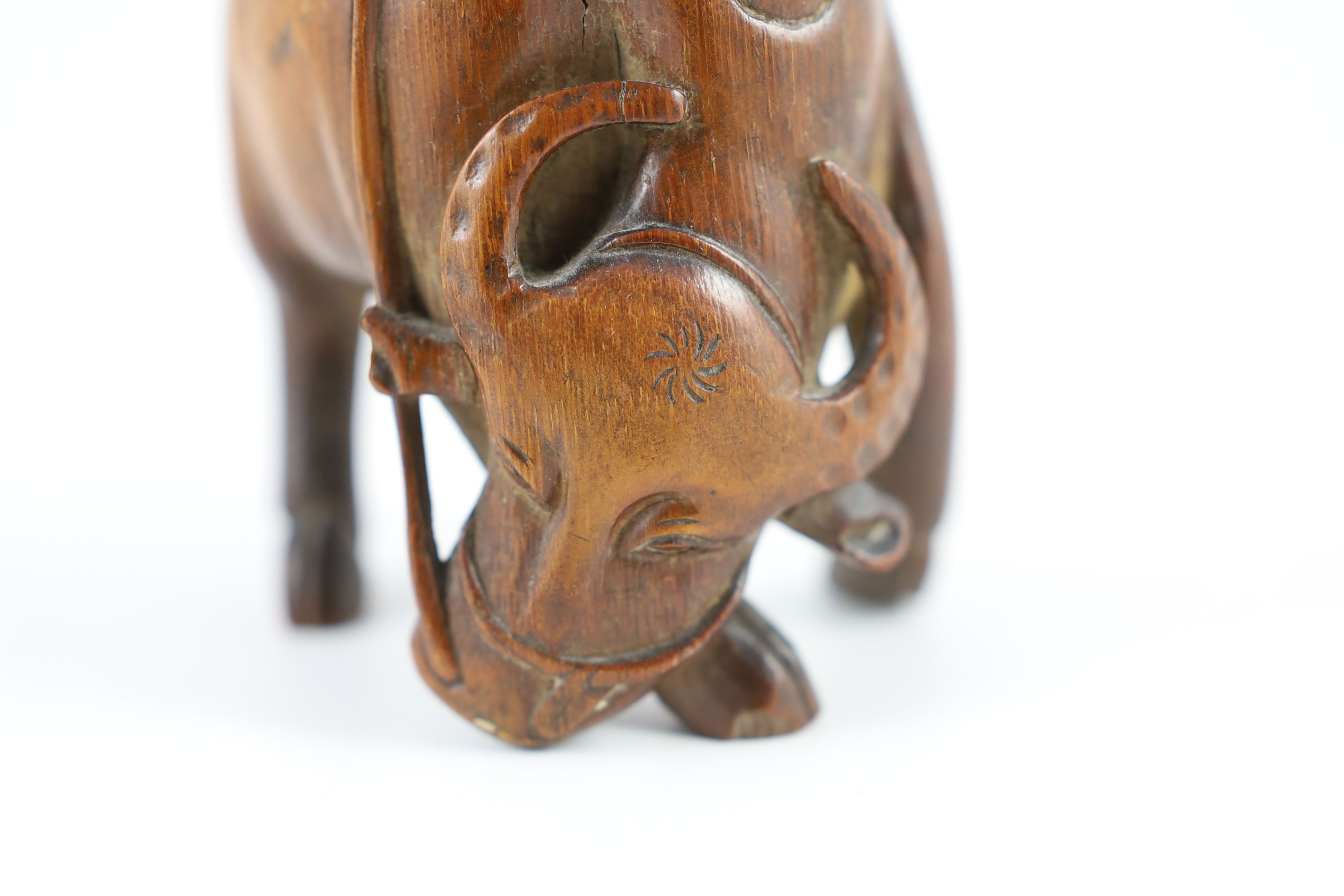 A Chinese bamboo group of boy riding a buffalo, 18th/19th century, 12.5 cm high